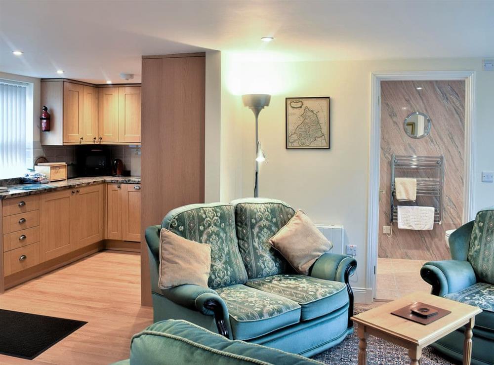 Open plan living space at Strand Cottage in Seahouses, Northumberland