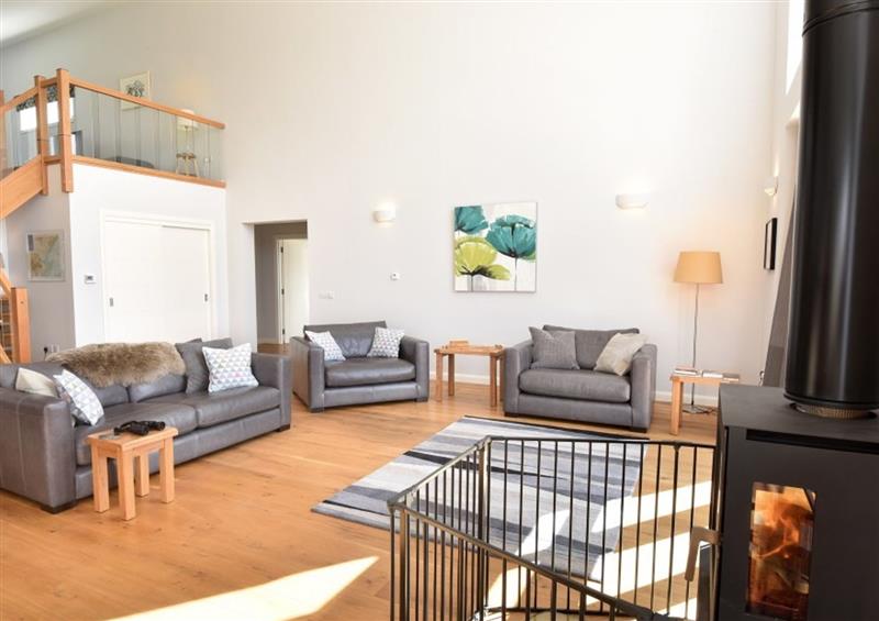 Relax in the living area at Strath Brora View, Brora
