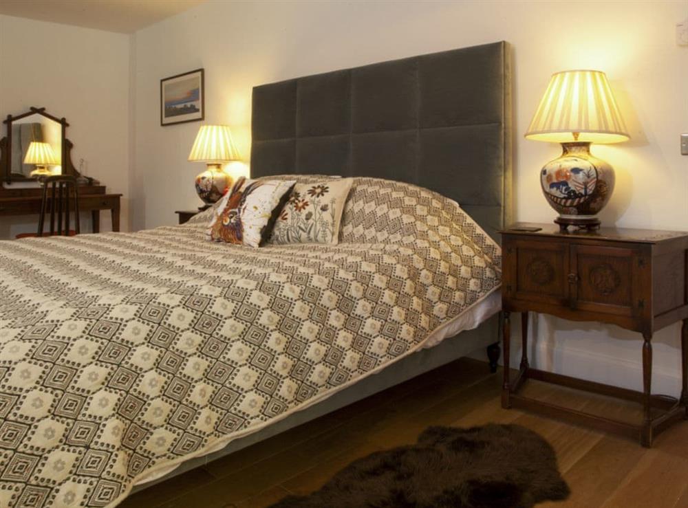 Super kingsize bed within the master bedroom at Strathspey Lodge in Duthil, Carrbridge, near Aviemore, Highlands, Inverness-Shire