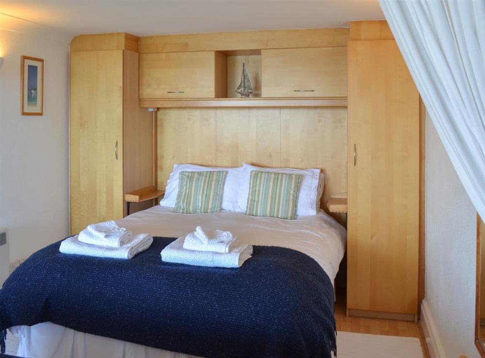Cosy and comfortable double bed at Studio Sea Urchin in Carbis Bay, near St Ives, Cornwall