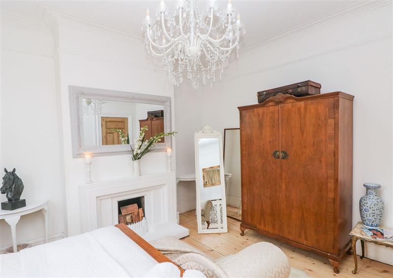 One of the bedrooms at Stunning Large Victorian Townhouse, Cardiff