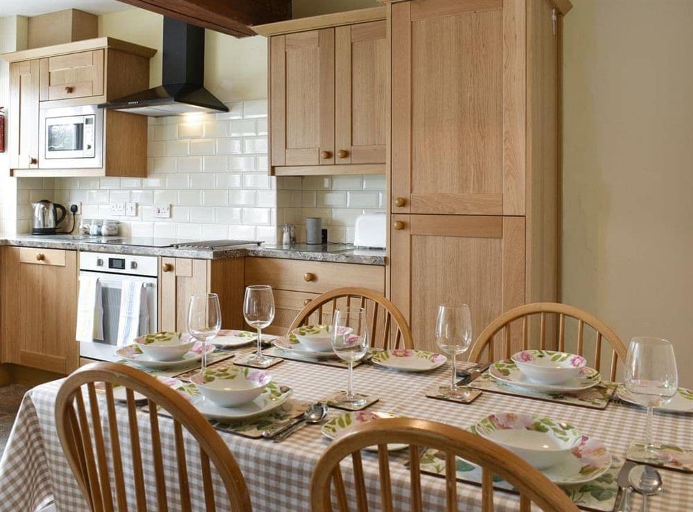 Convenient dining area within kitchen at Stybarrow View Cottage in Glenridding, Ullswater, Cumbria