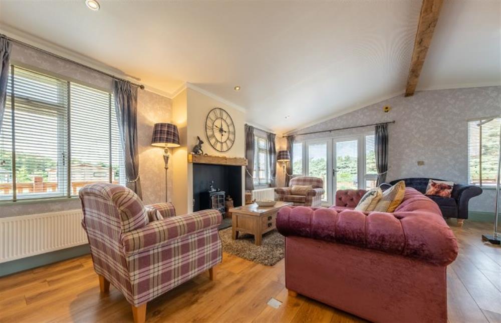 Ground floor: A spacious, airy sitting room area with Smart television at Suffolk Barn, Kelling near Holt