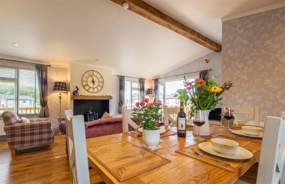 Ground floor: Dining room area back to sitting room at Suffolk Barn, Kelling near Holt