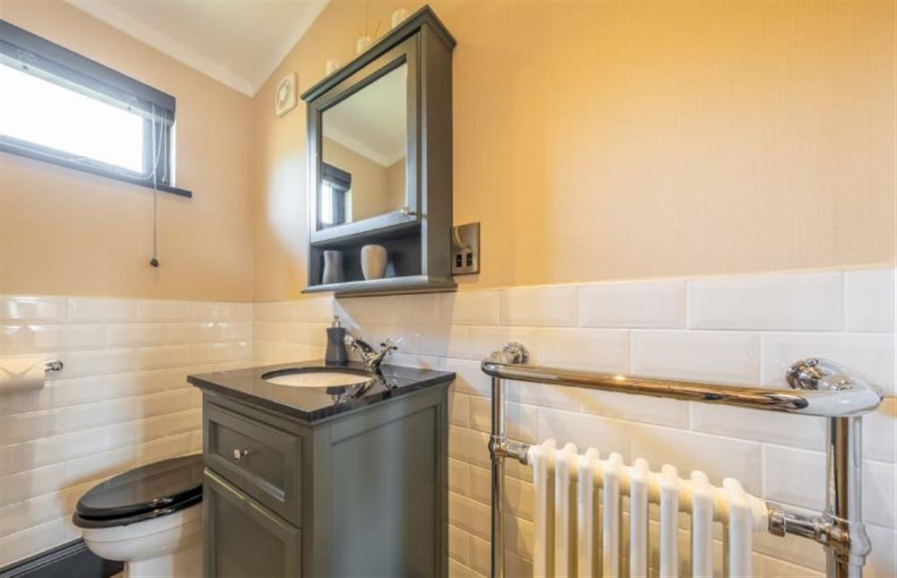Ground floor: En-suite with roll top bath, wash basin and WC