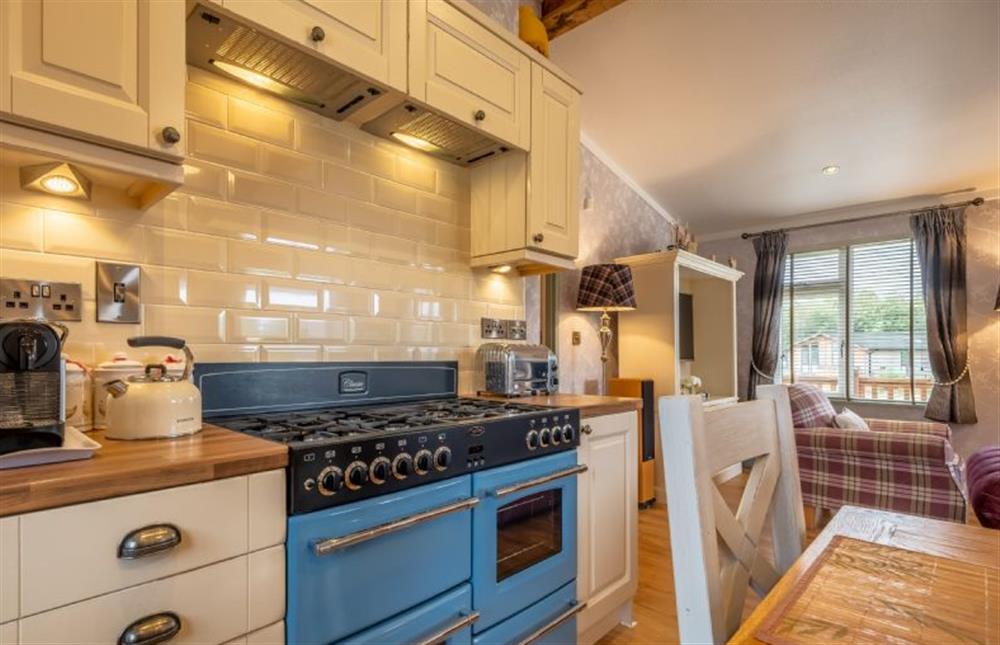 Ground floor: Well-equipped kitchen an electric range cooker  at Suffolk Barn, Kelling near Holt