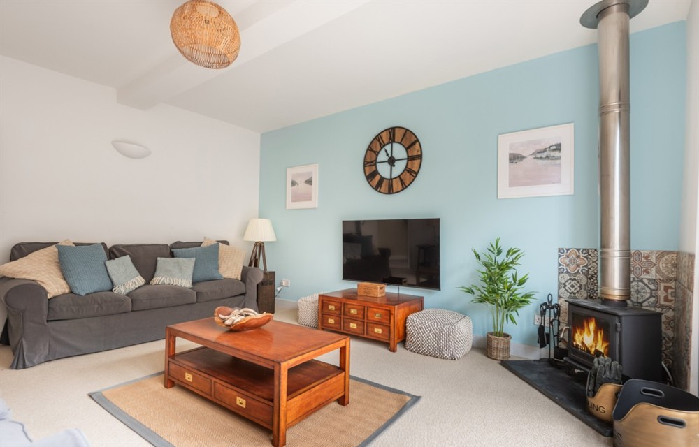 Relax in the living area at Suffolk Cottage in East Allington