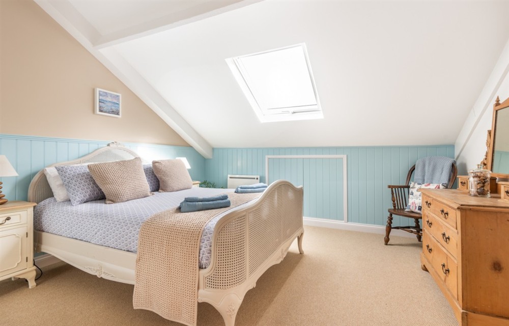 This is a bedroom at Suffolk Cottage in East Allington
