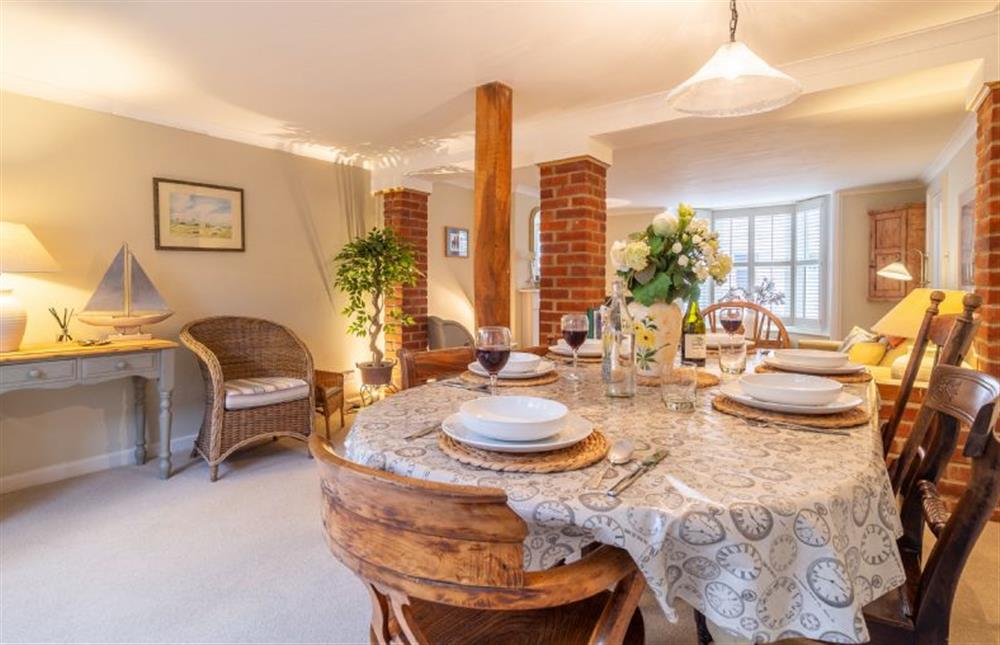 Dining room with dining table and chairs for up to seven guests at Suffolk House, Aldeburgh