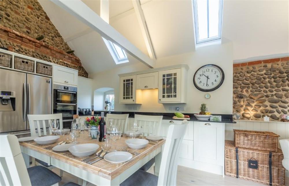 Ground floor: Dining area and kitchen at Summer Barn, Weybourne near Holt