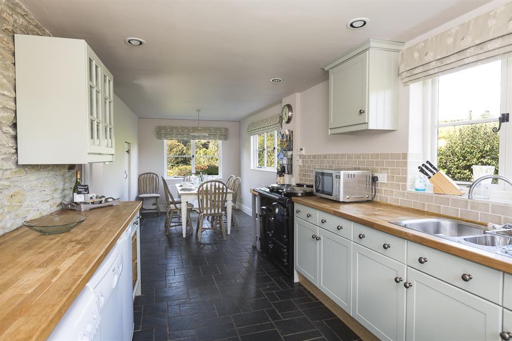 A well-equipped kitchen featuring a good number of wall and base units at Summer Cottage in , Salcombe