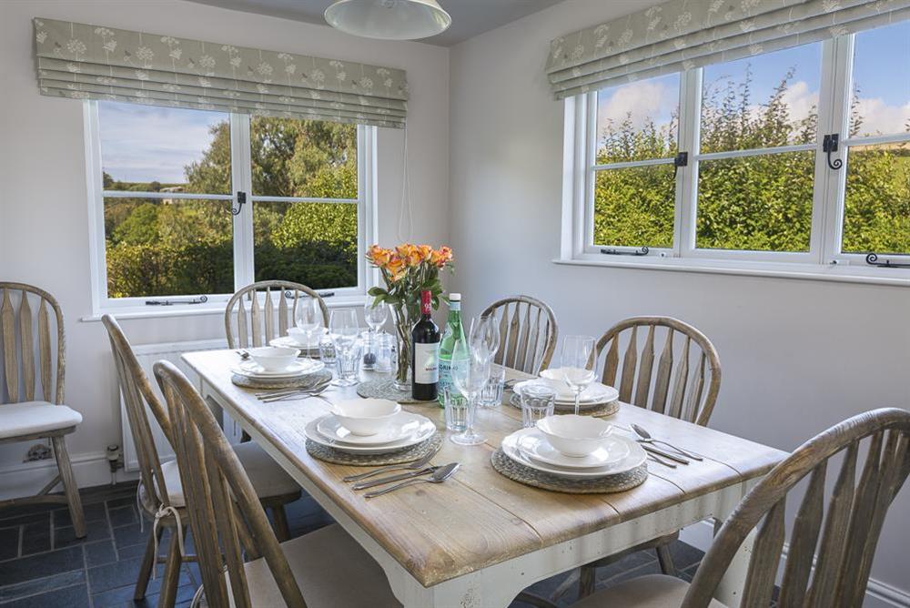 Wooden table seating 6-8 guests at Summer Cottage in , Salcombe