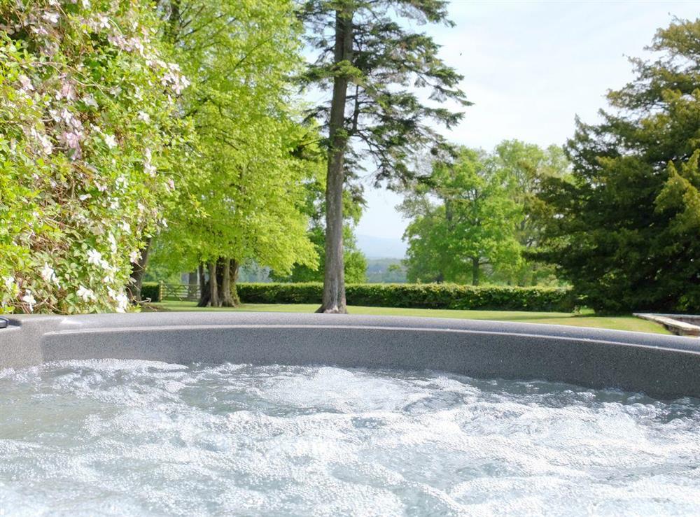 Relaxing hot tub in scenic setting at Summer House in St Asaph, Denbighshire