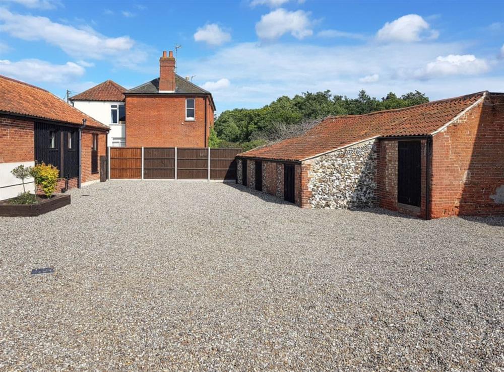 Gravelled forecourt with ample parking at Summer House Stables in Catfield, near Stalham, Norfolk