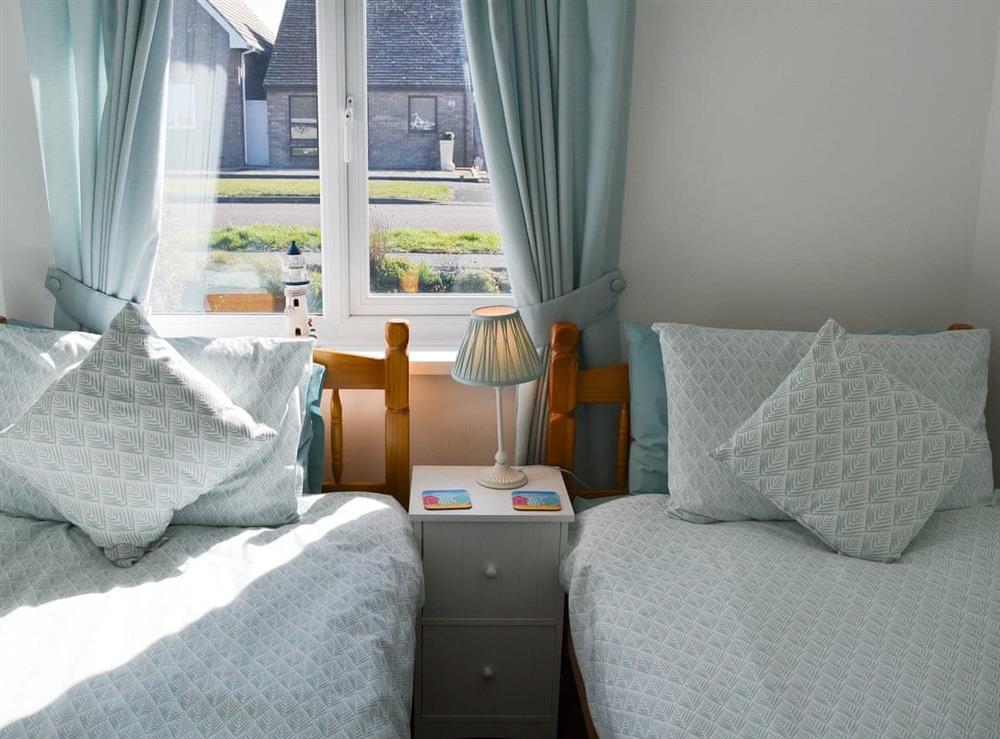 Cosy twin bedroom (photo 2) at Summerhouse Cottage in Beadnell, near Seahouses, Northumberland