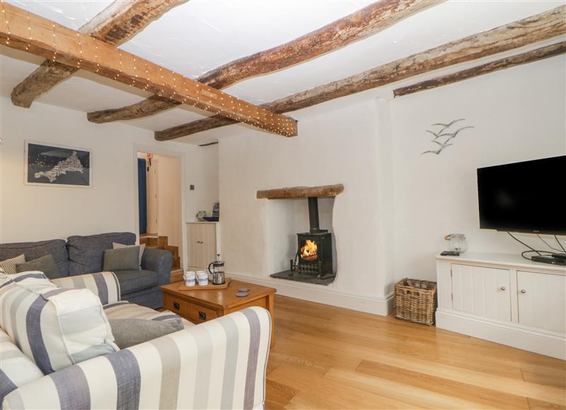 Relax in the living area at Sun Cottage, Looe