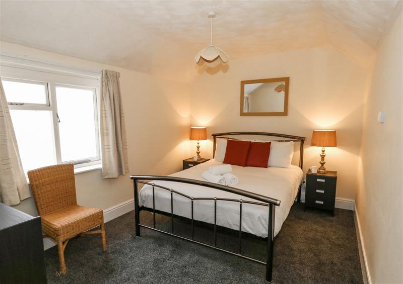 A bedroom in Sunbeach at Sunbeach, Weymouth