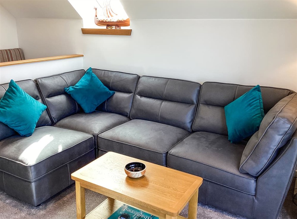 Open plan living space at Sundown Apartment in Thurso, Caithness