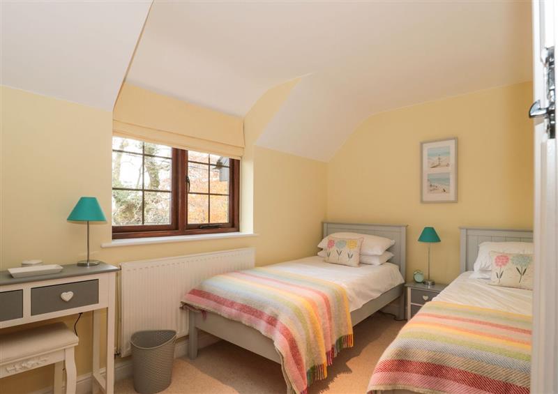 A bedroom in Sundowner Cottage at Sundowner Cottage, Axminster