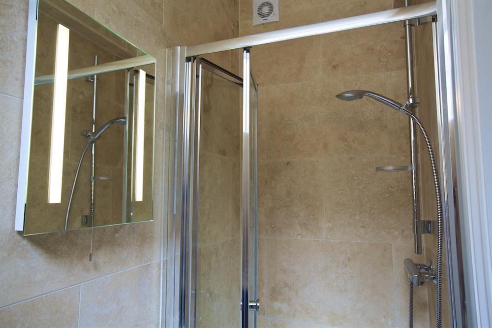 Shower room accessed from the snug room at Sundowners in , Salcombe
