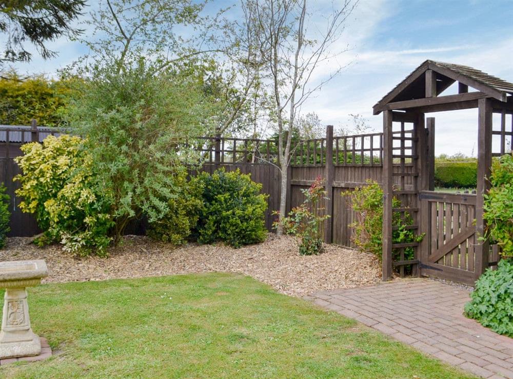 Garden at Sunflower Holiday Cottage in Thoresthorpe, near Alford, Lincolnshire