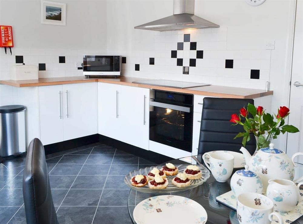 Large kitchen with dining area (photo 2) at Sunny Bank in Bude, Cornwall