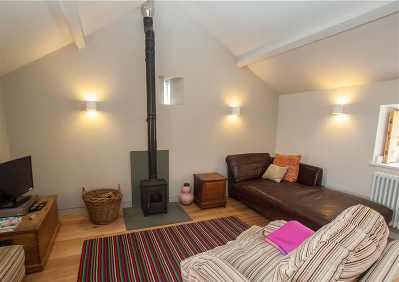 Relax in the living area at Sunny Brow Barn, Outgate near Hawkshead