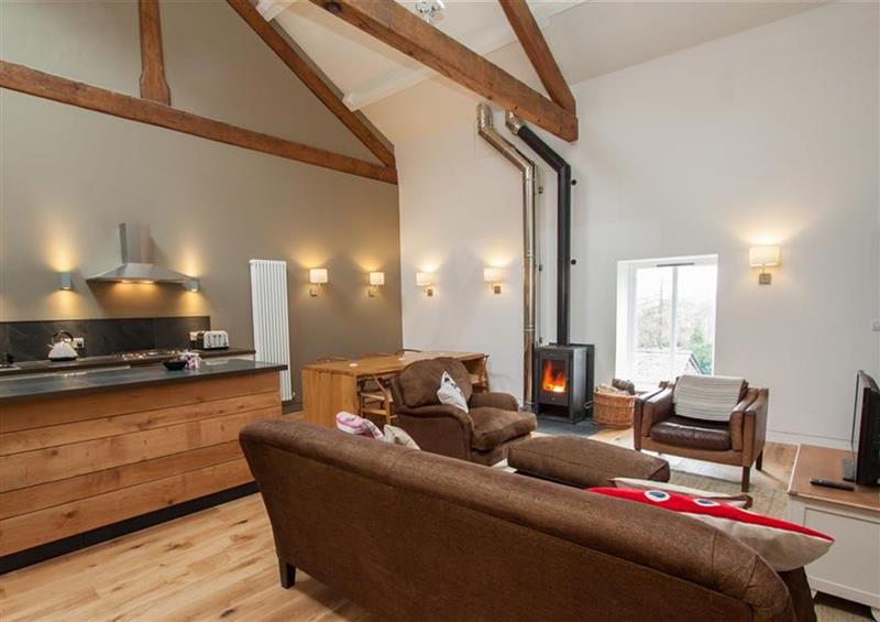 Relax in the living area at Sunny Brow Hayloft, Hawkshead
