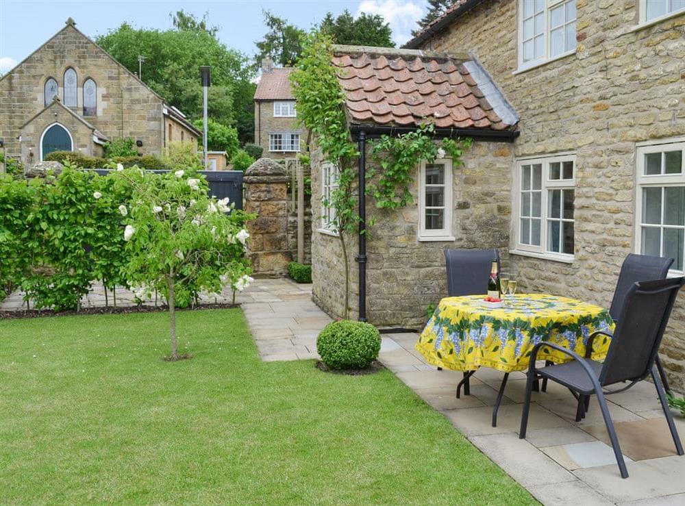 Lovely garden with seating area at Sunny Cottage in Welburn, near York, North Yorkshire