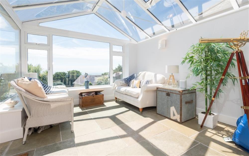 The conservatory with sea views at Sunny Ridge in Salcombe