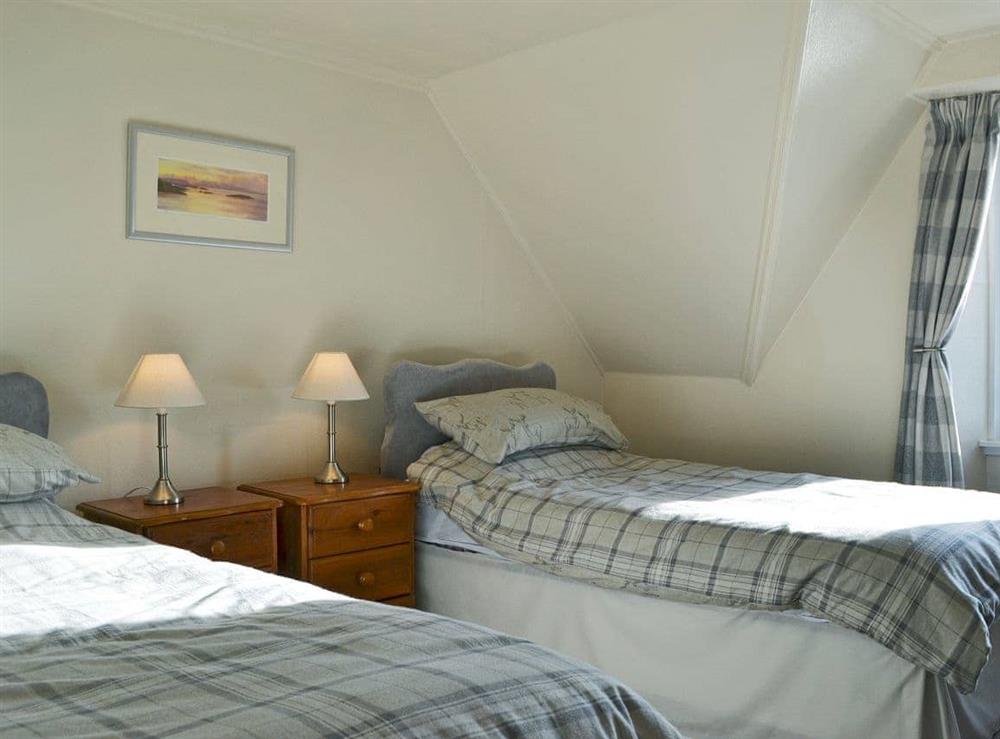 Comfortable twin bedroom at Sunnybank Cottage in Inveralligin, near Torridon, Ross-Shire