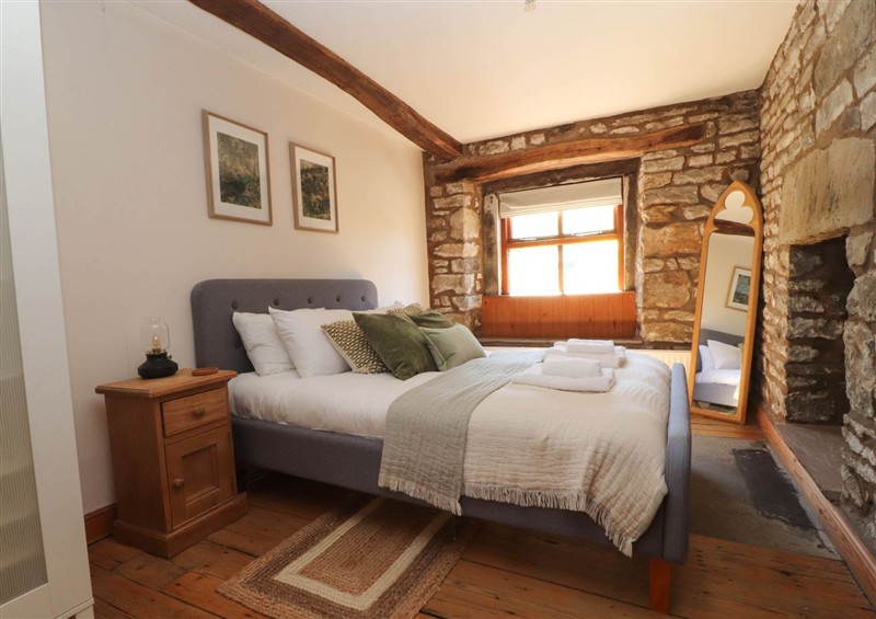 A bedroom in Sunnybrook Cottage at Sunnybrook Cottage, Bentham