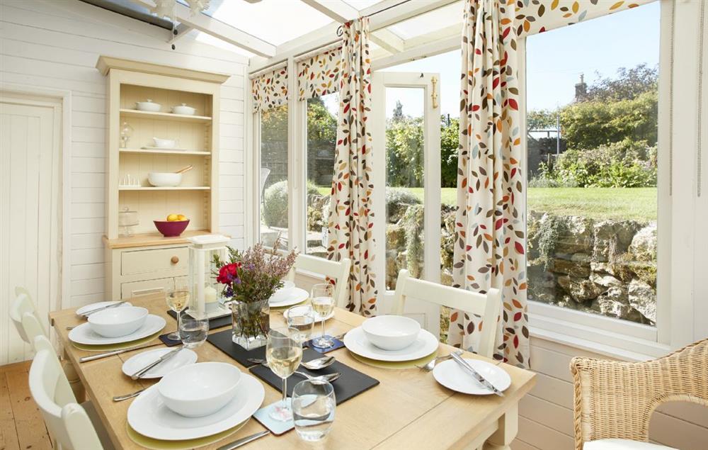 The dining room overlooking the beautiful garden (photo 2) at Sunnylea Cottage, Great Longstone