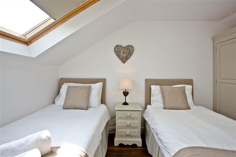 Twin bedroom (photo 2) at Sunnymead Penthouse, Exmouth, Devon