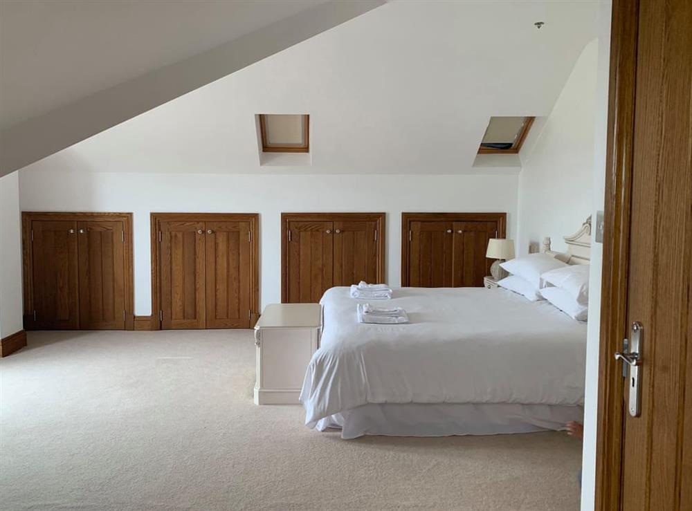 Spacious bedroom with kingsize bed (photo 7) at Sunnymeade in Stainton with Adgarley, near Dalton-in-Funess, Cumbria