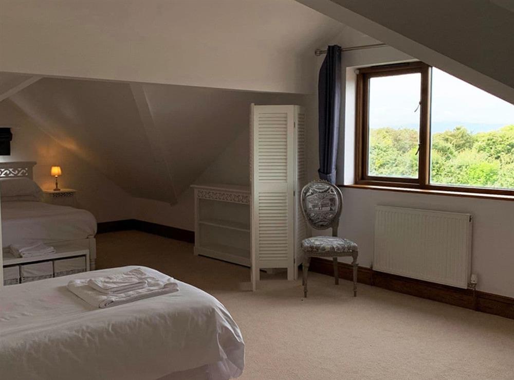 Spacious bedroom with two kingsize beds (photo 3) at Sunnymeade in Stainton with Adgarley, near Dalton-in-Funess, Cumbria
