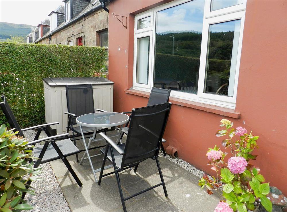 Patio to the front with furniture at Sunnyside Cottage in Lamlash, Isle Of Arran