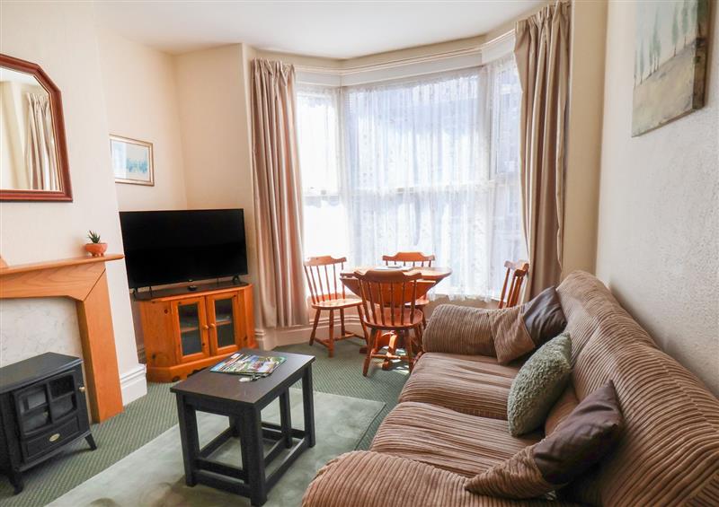 Relax in the living area at Sunnyside Holiday Apartment 2, Bridlington