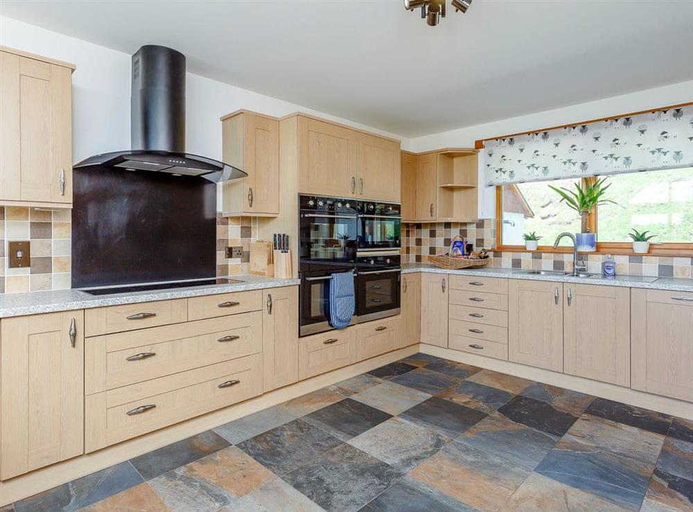 Spacious kitchen area at Sunnyside House in Carrbridge, near Aviemore, Inverness-Shire