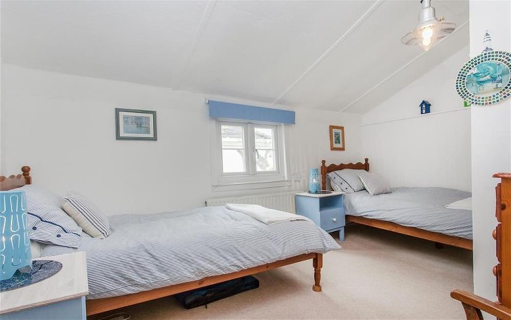 Twin beds in bedroom 1 at Sunnyside in Lyme Regis