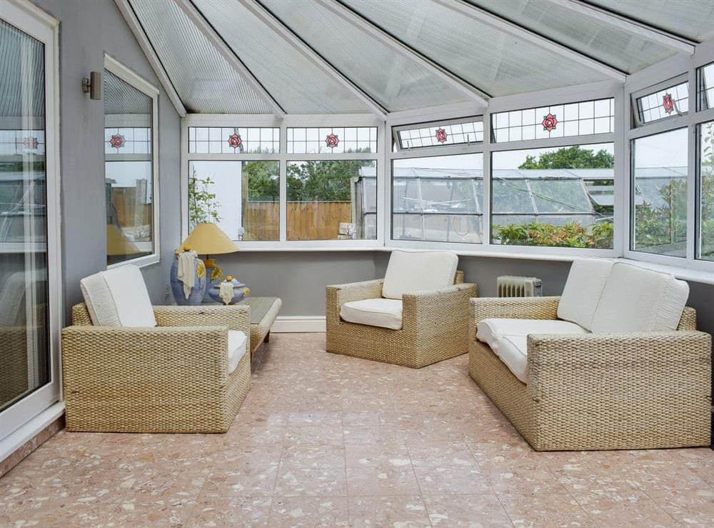 Light and airy conservatory at Sunset Cottage in Halsall, near Ormskirk, Lancashire