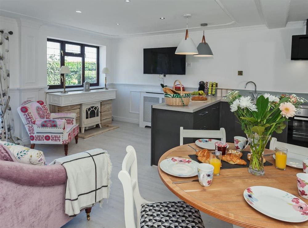 Stylishly furnished open plan living space at Sunset Cottage in Halsall, near Ormskirk, Lancashire