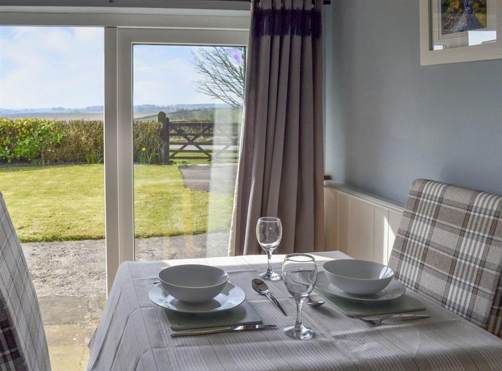 Quaint dining area with delightful views at Sunset Cottage in Pickering, North Yorkshire