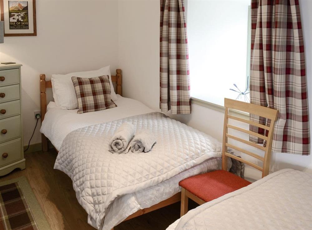 Comfortable twin bedroom at Sunset Cottage in Portmahomack, near Tain, Ross-Shire