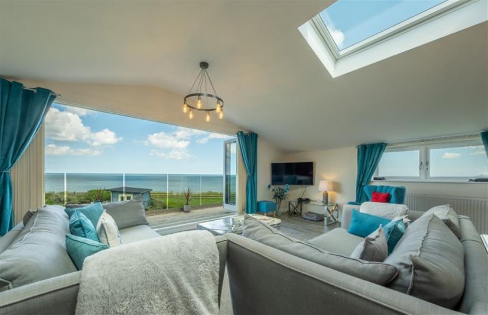 First floor: Double aspect and with a velux window for a light and airy living space at Sunset, Overstrand near Cromer