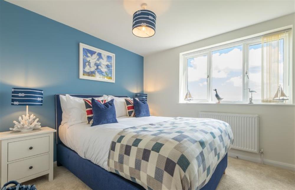 Ground floor: Bedroom two with a blue theme at Sunset, Overstrand near Cromer