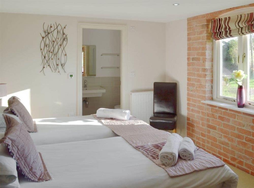 Double bedroom with 6ft bed (zip & link) and en-suite shower room (photo 2) at Sunshine Cottage in Kirk Langley, Ashbourne, Derbyshire., Great Britain