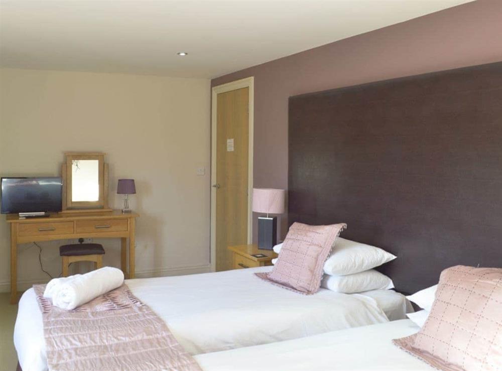 Double bedroom with 6ft bed (zip & link) and en-suite shower room at Sunshine Cottage in Kirk Langley, Ashbourne, Derbyshire., Great Britain