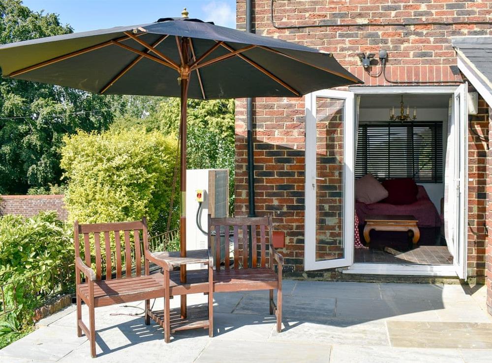 Delightful patio area at Sunwood House in Ditcham, near Petersfield, Hampshire