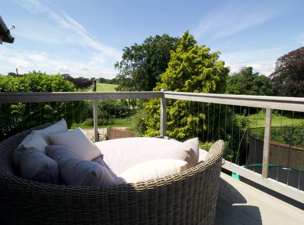 Relaxing balcony area at Sunwood House in Ditcham, near Petersfield, Hampshire